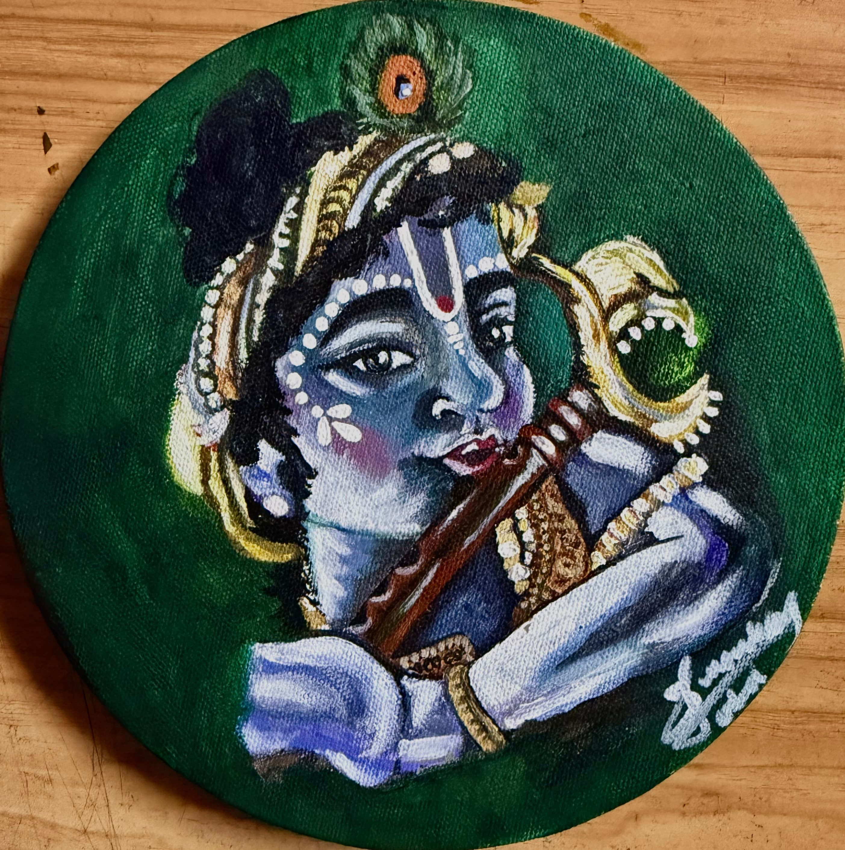 Circular acrylic portrait of Krishna holding a flute against a deep green background