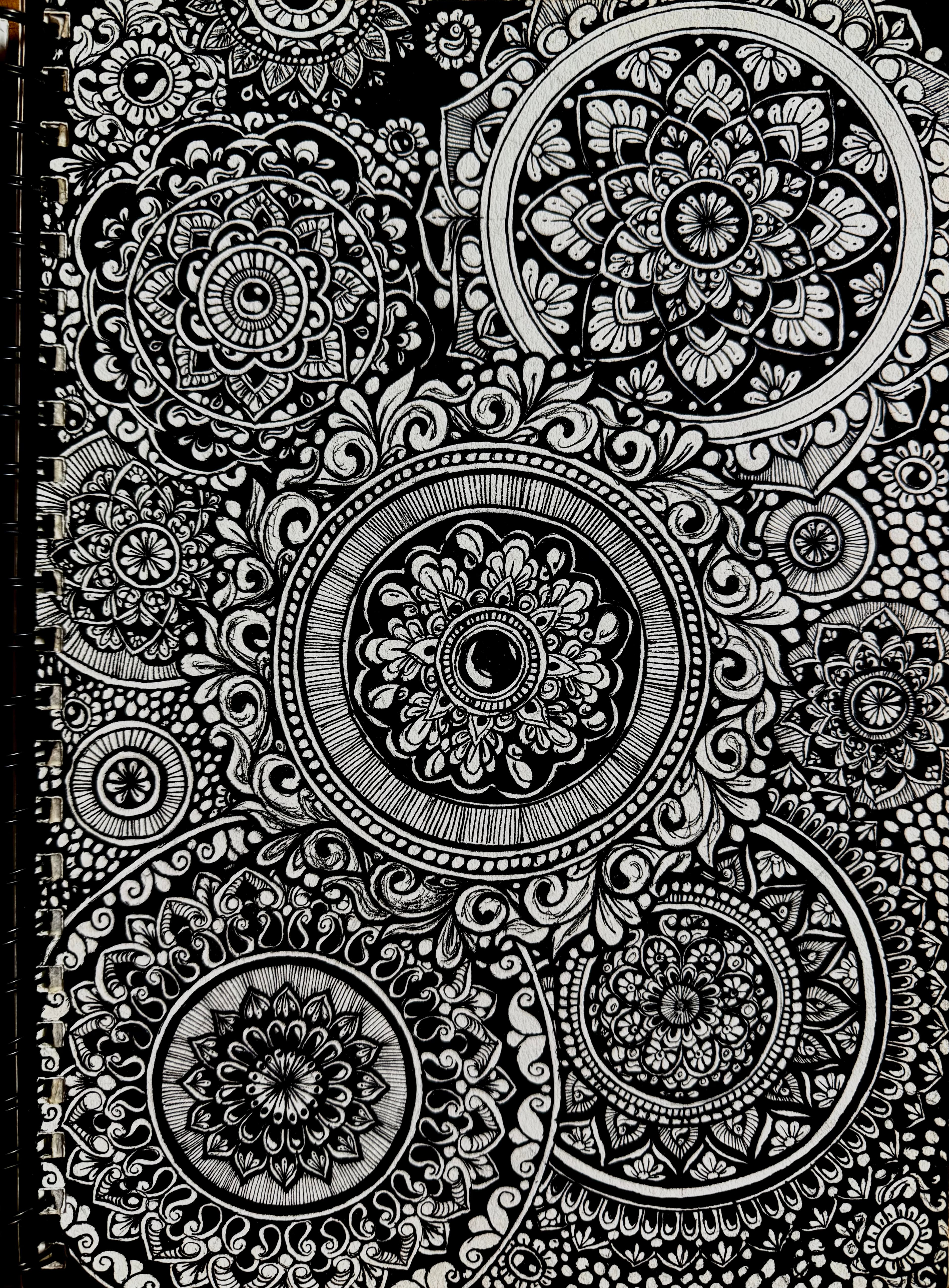 Detailed black-and-white composition of overlapping mandalas and floral linework