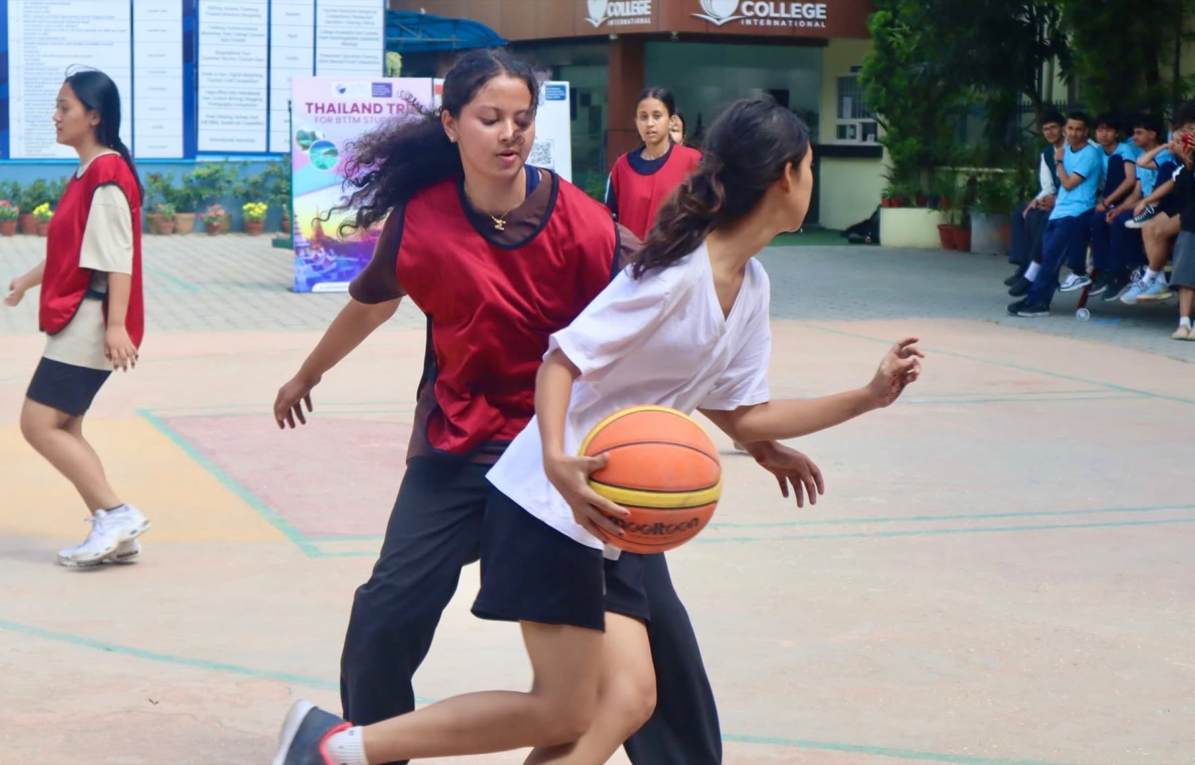 Moulikta defending during a basketball game